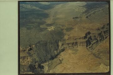 View up Toroweap Valley; Vulcans Throne at the edge of the Canyon.  The head of Vulcan Rapid can be seen at the mouth of Prospect Canyon at lower left