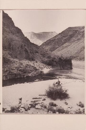 Boat, helicopter and camp at Tapeats Creek.  Belknap shifts his cameras