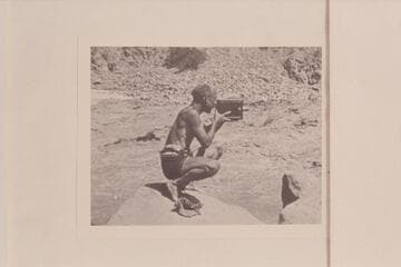 Oscar Jaeger photographing the "Powell" on the rocks at Dubendorff Rapid