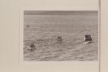 The "Gale V" being towed off the course after flipping on Lake Mead in the Gold Cup Races