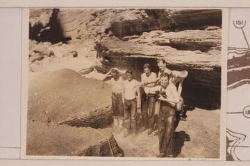 Members of the 1934 crew under the dripping spring at Mile 155 1/2