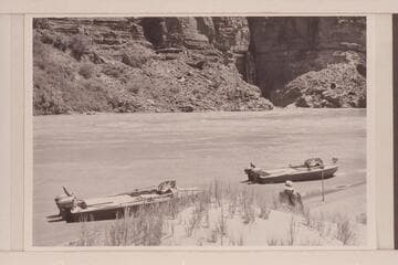 Boats moored opposite Deer Creek.  The "Cactus" is left foreground.  The "Bootoo" is right foreground.  The "Rattlesnake" is at left in the background across river.  Masland is back of the sand dune