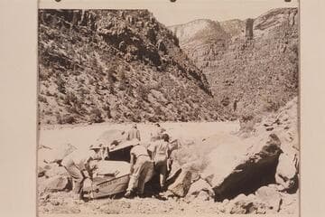 Portage of Hells Half Mile by Nevills party.  Marston Green River Expedition