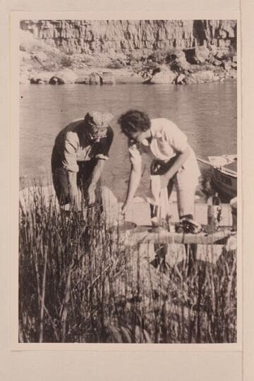 Millie Baker and Doris Nevills washing dishes on the 1940 river trip