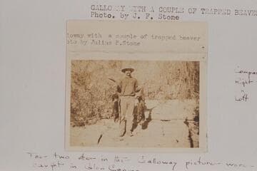 Nathan Galloway with a couple of trapped beaver [otters]