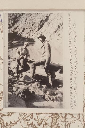 Emery Kolb posed with tools as though repairing the old punt at the mouth of Diamond Creek which had been left there from the dam site drilling operations