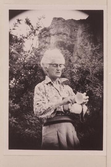 Mary Abbott struggles with the dishes.  Camp at Kwagunt Rapid