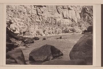 Lug Larsen pulls out of lower end of Triplet Rapids.  Low water