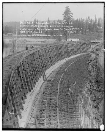 Big Creek Huntington Lake Dams - Dam #3 completed to elev. 6915' with trestle, chutes, drains & reinforcing in place ready to complete dam to elevation 6952.5'. Job H