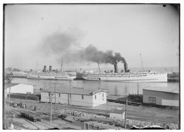 The S.S. Harvard (right) and the S.S. Yale (left) at San Pedro Harbor