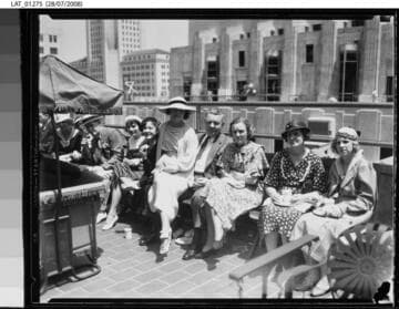 Guests relaxing at Harry Chandler's 70th birthday party