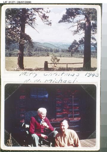 Harry Chandler & W.W. Michael on front porch of cabin