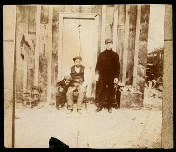 Y. C. Hong (as a toddler), Y. C.'s father, and unidentified man