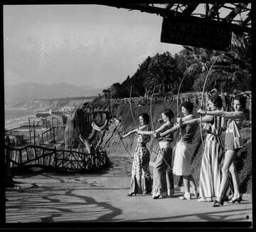Models posing as archers near Sunset Trail at Palisades park, Santa Monica