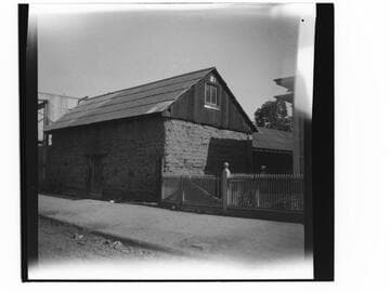 Adobe building and wooden fence, Los Angeles