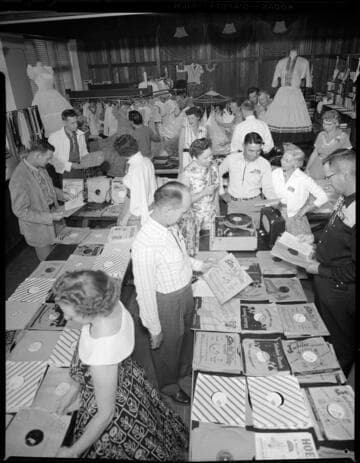 Store with clothing and 78 records for sale