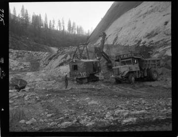 Big Creek - Mammoth Pool - Excavating rock toe access road against West abutment