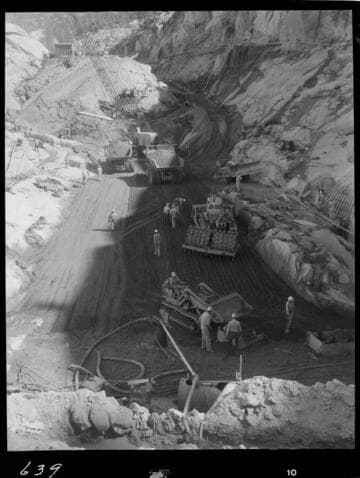 Big Creek - Mammoth Pool - Embankment placement and dental concrete in bottom on cutoff trench