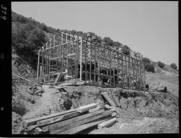 Big Creek - Mammoth Pool - Building under construction around compressors at outlet portal of power tunnel