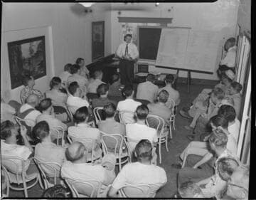 Employees filling out surveys from California Institute of Technology