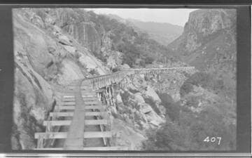 The Tule Plant flume near the upper end winding through the mountains