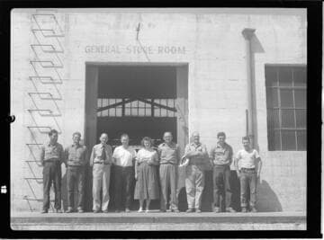 Group of employees outside General Store Room