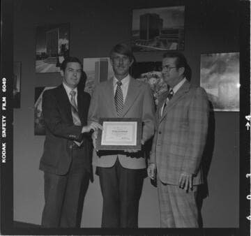 Conservation award presented to Tooley & Company