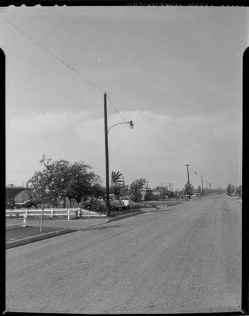 Street-lighting on a residential street and on a business street