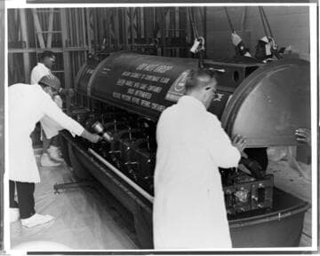 Workers preparing refueling bundles for Unit 1 Reactor and loading the fuel into the reactor at San Onofre Nuclear Generating Station