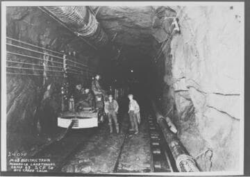 M-68 Electric train and men from Camp 63 working in Florence Lake Tunnel