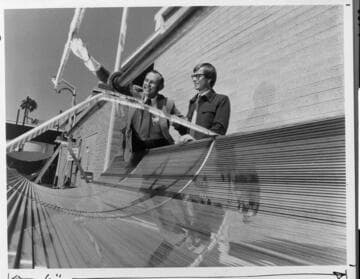 Edison engineers viewing an experimental solar trough