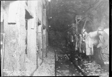 Workers in Florence Lake tunnel
