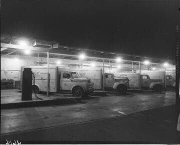 Challenge ice cream trucks lined up at loading dock