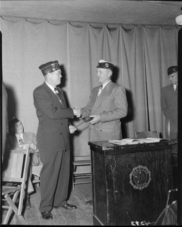 Passing on the gavel at the Edison American Leagion meeting