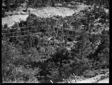Aerial photo showing helicopter doing aerial patrols of the Big Creek transmission line towers