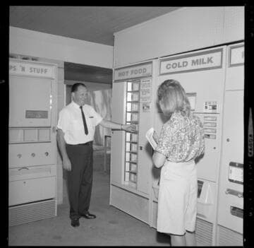 All Electric Building plate displayed on a column support at a high school or college