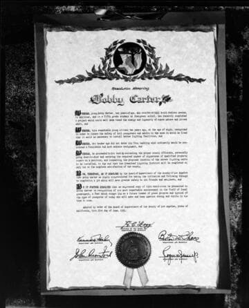 Boy's award from Los Angeles City Council for street lighting campaign project