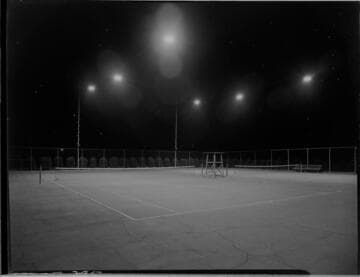 Lighted tennis courts and playground