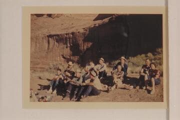 The San Juan party which left Mexican Hat with the Mexican Hat Expedition on 1952, June 04.  Posed outside Hidden Passage