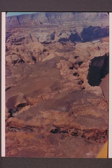 The mouth of Toh Dilth Ylth.  Mouth of Aztec Creek and Cummings Mesa above.  Approximate gauge:  30,000 cfs