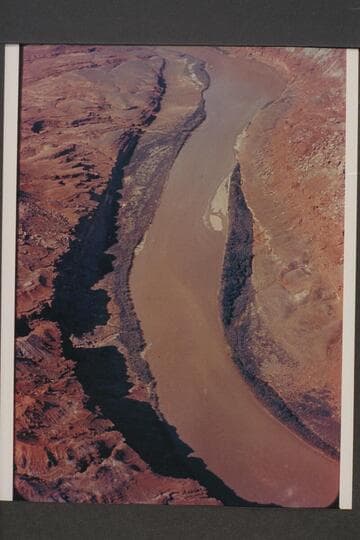 Southwest to Mile 15515 [sic] and 153.5.  Glen Canyon.  Preliminary gauge:  29,700 cfs