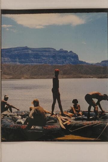 Georgie White's smaller units being towed on Lake Mead. End of 1956, July traverse of Grand Canyon