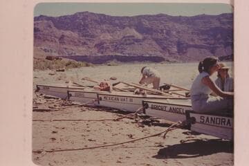 "Mexican Hat Expeditions" of sadirons lined up at Paria Riffle prior to departure for Grand Canyon traverse