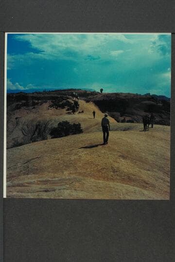 Westerly over slick rock toward drop into Bald Rock Canyon