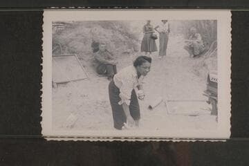 Lodell Matthews offers a drink of cold water.  Preston Mercer sitting left.  Dick Spring sitting right.  Margaret Marston and Dudy Thomas background center.  Lees Ferry