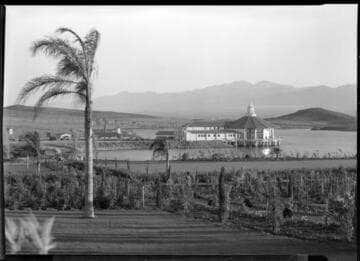 Hotel building and lake, Norco. 1928