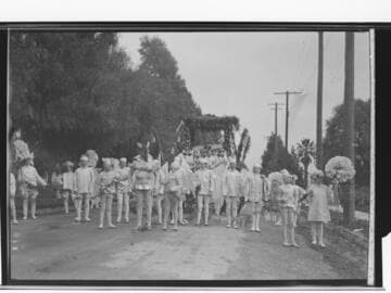 Floats in early Tournament of Roses parade, Pasadena. approximately 1909