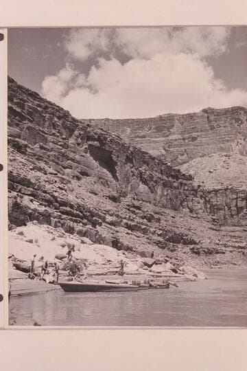 Replacing shields on the "BOOTOO" and "CACTUS" after North Canyon Rapid had torn them off.  A change of loading putting more weight aft, reduced the water coming over the bow.  L to R:  Desloge, Belknap, Sanderson, Visbak, Taylor and Eisaman