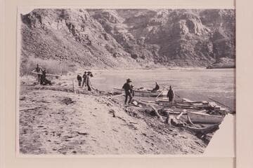 Stanton's boat at Lees Ferry.  The far boat has two steering oars.  The skiff used by Galloway, Stone and Knox in 1898, Nov., had two oarlocks on the stern