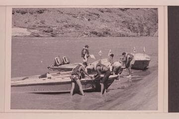 The fleet beached for repairs just above Granite Narrows